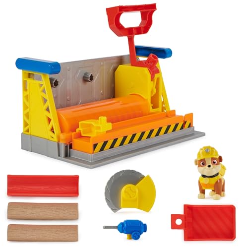 Rubble & Crew - Set de joacă atelier cu 2 accesorii de unelte, 1 figură Rubble, 85g nisip cinetic Build-it și 1 matriță, jucărie pentru copii de la 3 ani