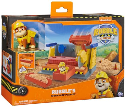 Rubble & Crew - Set de joacă atelier cu 2 accesorii de unelte, 1 figură Rubble, 85g nisip cinetic Build-it și 1 matriță, jucărie pentru copii de la 3 ani