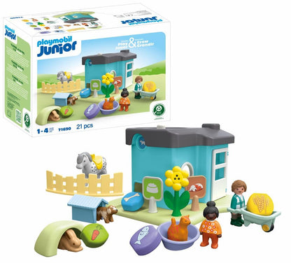 PLAYMOBIL JUNIOR | Adăpost pentru animale cu distribuitor de hrană | jucărie ecologică din plastice biobazate | pentru copii de la 1 an | 71690