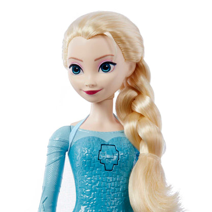 Jucărie Mattel Disney Frozen - Păpușa Elsa cântătoare, îmbrăcată în stilul caracteristic, cântă „Lass jetzt los” din filmul Disney „Frozen”, cadou pentru copii, versiunea germană HMG32