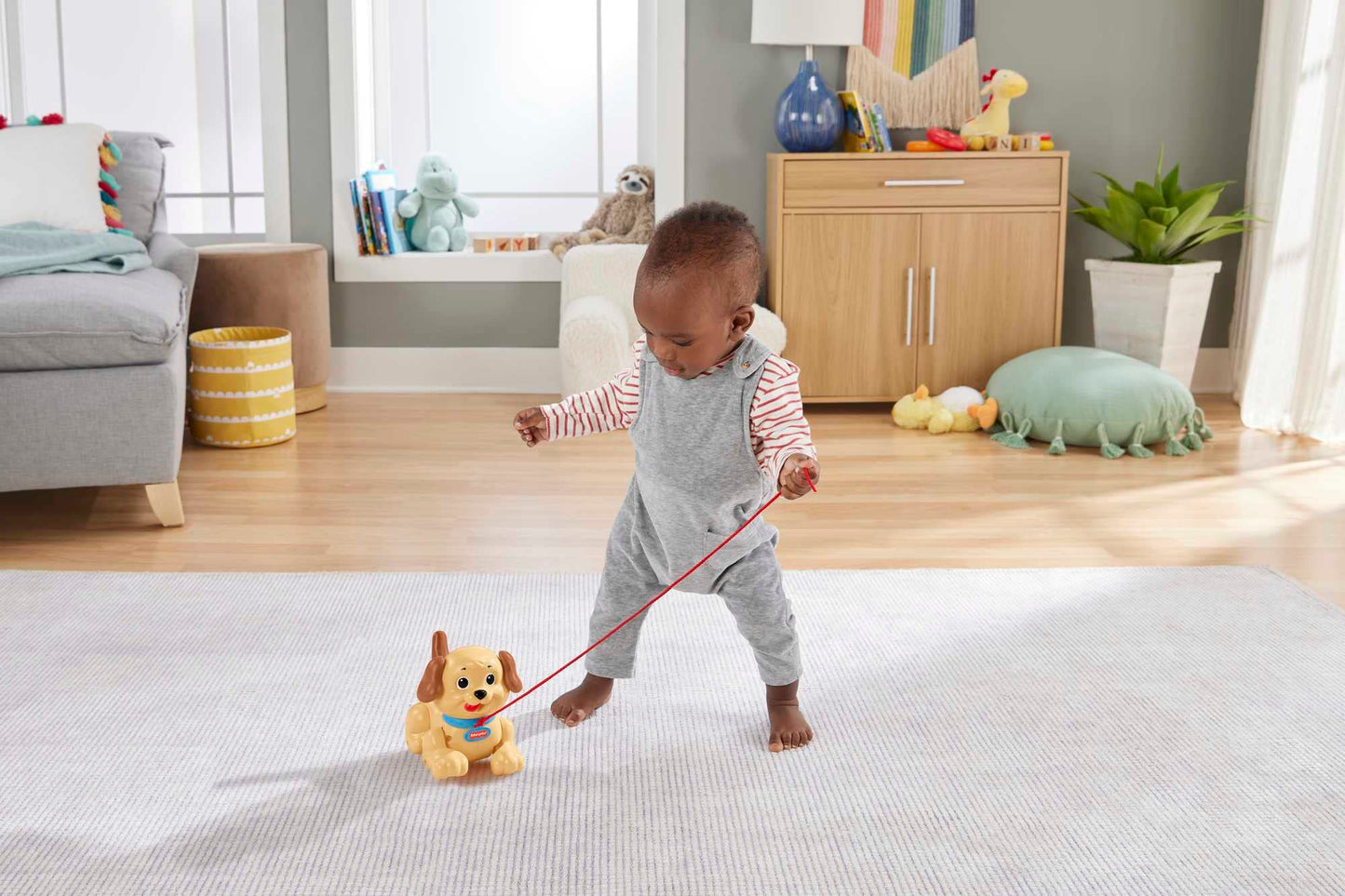 Fisher-Price H9447 Set de joacă cu cățeluș tras de sfoară cu sunete amuzante de la 12 luni