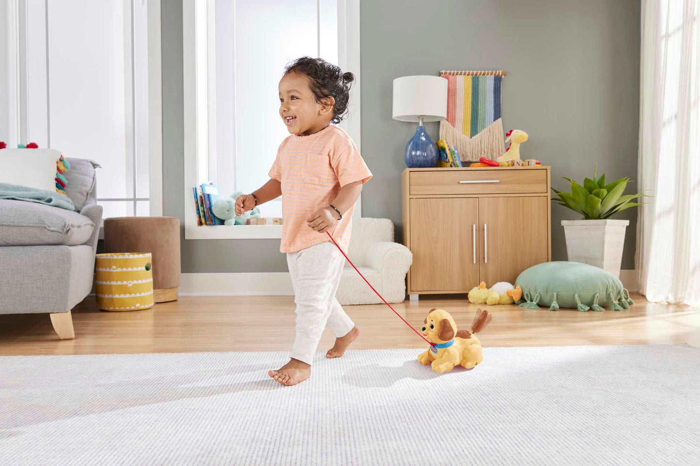 Fisher-Price H9447 Set de joacă cu cățeluș tras de sfoară cu sunete amuzante de la 12 luni