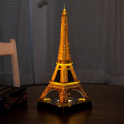 Puzzle 3D Ravensburger 12579 - Turnul Eiffel Night Edition - Model 3D iluminat cu LED, de construit - Recomandat de la 10 ani
