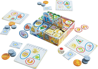 HABA Meine ersten Spiele Set de societate Cumpărături cu stand de piață 3D, bani de jucărie din lemn și liste de cumpărături de la 2 ani